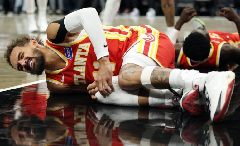  Trae Young suffers knee injury in Hawks’ game vs. Nets